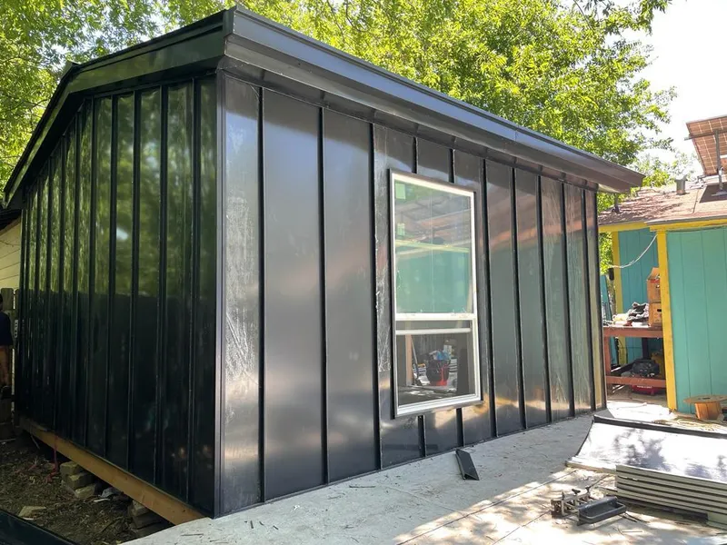 Black standing seam metal wall panels for Roof Inspection in Bethel